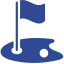 Blue golf flag in hole on green.