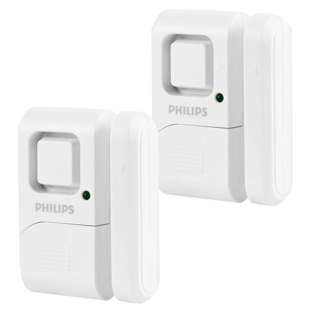 Two white Philips door/window sensors with a green status light.