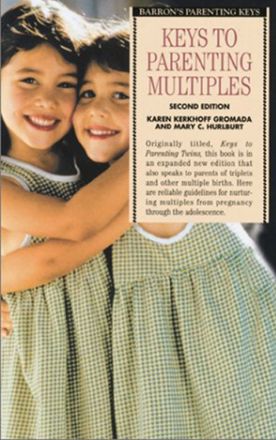 Two smiling girls hugging, with a book cover titled 
