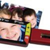 Three smiling children looking through a red viewfinder, with a red box nearby.