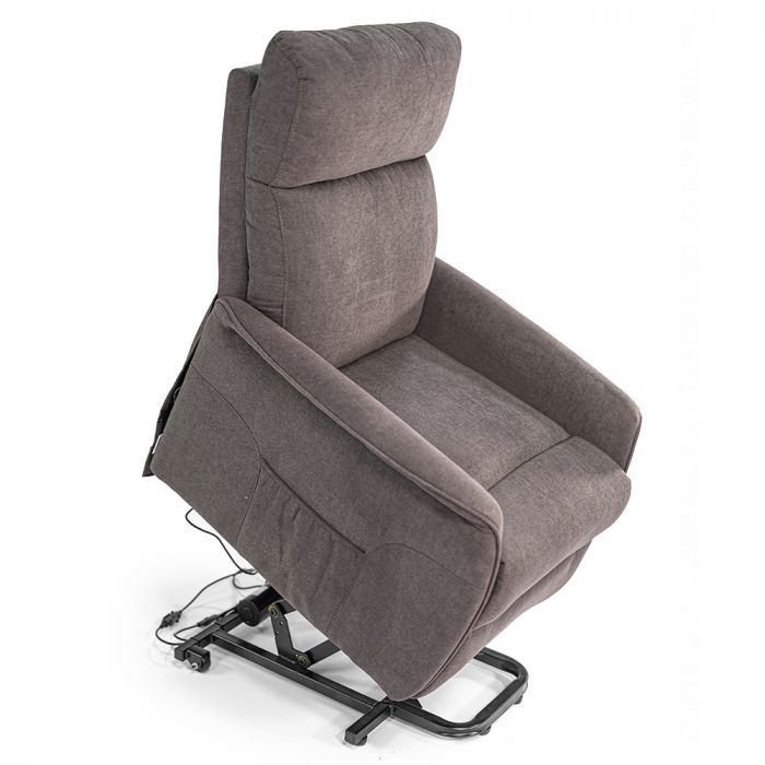 Brown power lift recliner chair, angled up, with user assist feature.