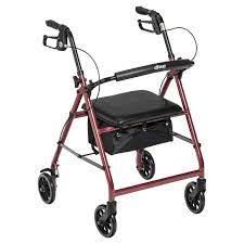 Red Drive Medical rolling walker with seat and storage pouch.