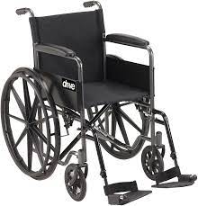 Black wheelchair with armrests and footrests, set against a white background.
