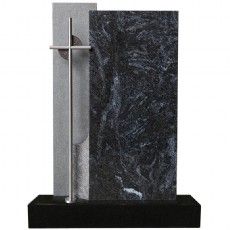 Es ist ein Grabstein mit einem Kreuz darauf.