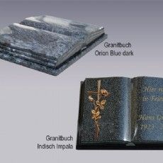Ein Stapel Granitplatten und ein Buch mit einem Kreuz auf dem Einband.