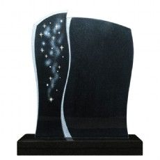 Ein schwarzer Grabstein mit einem weißen Wirbel und Sternen darauf.