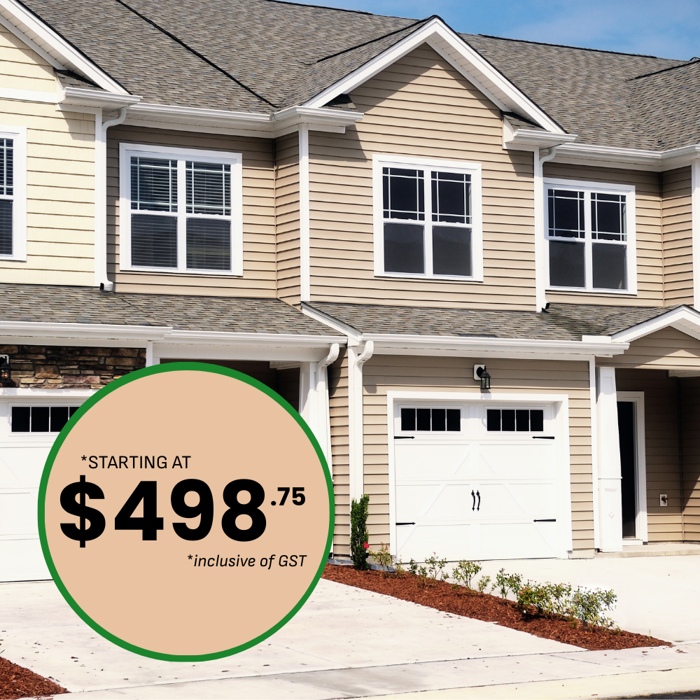 Townhouses with tan siding, white trim, and a price starting at $498.75.