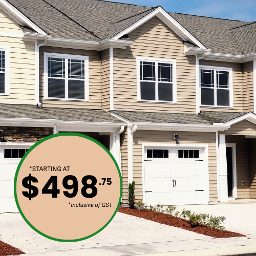 Townhouses with tan siding, white trim, and a price starting at $498.75.