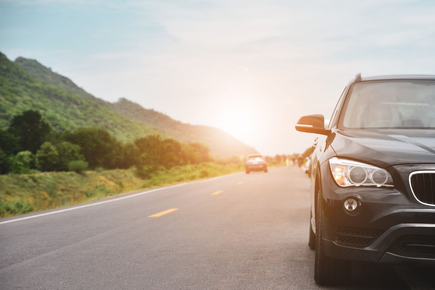A group of people are hiking in the woods.