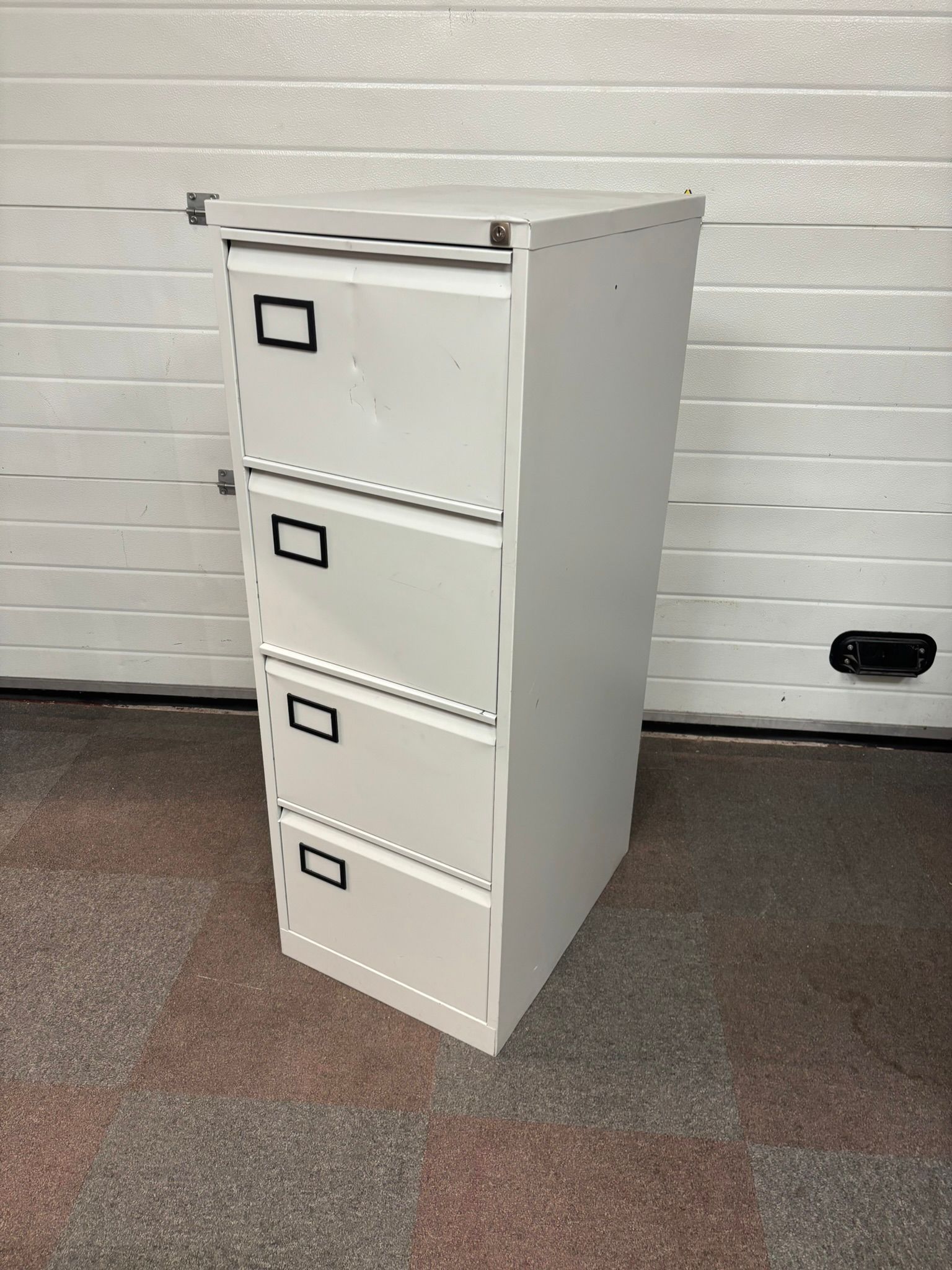 Used Four Drawer Silver Filing Cabinet