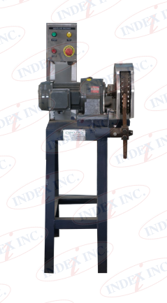 A machine is sitting on a stand with the word index on it