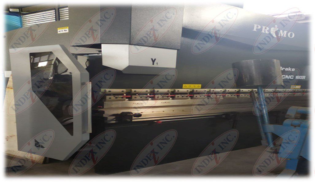 A machine is sitting on a table in a factory.