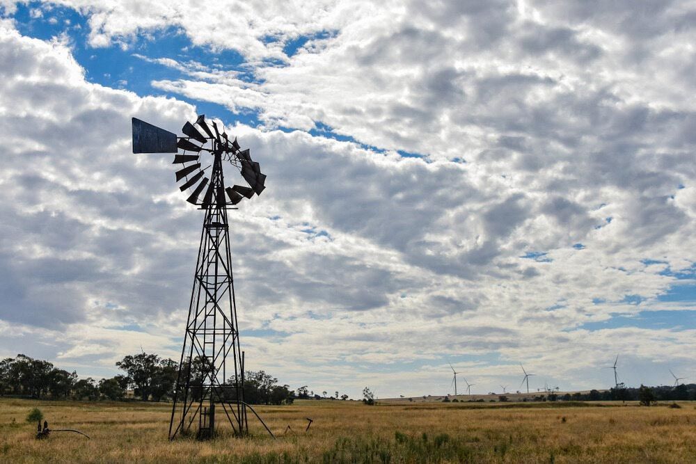 A Lighthouse Is Sitting On Top Of A Cliff  — Regional Concreting Solutions In Cudal, NSW