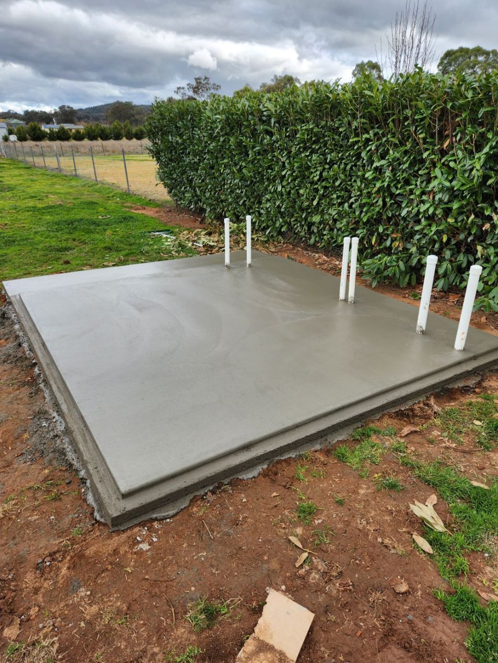 Yellow Excavator — Regional Concreting Solutions In Orange, NSW