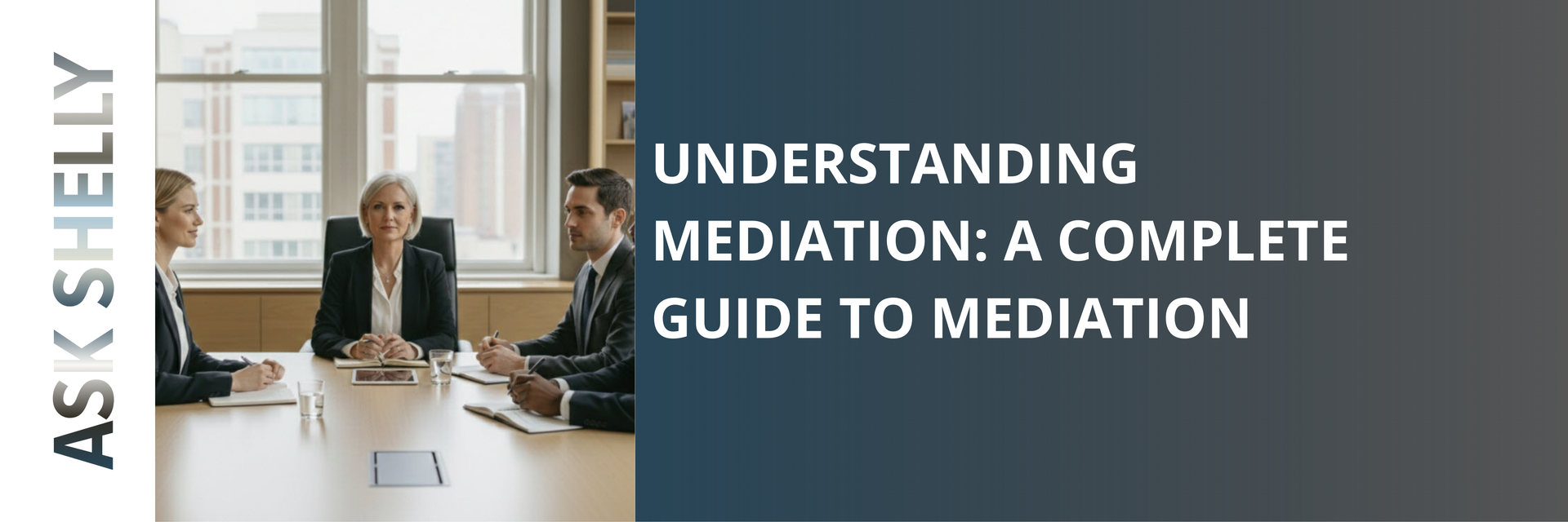 Man with glasses smiling, looking at the viewer. He's wearing a white shirt and using a laptop in a bright room.