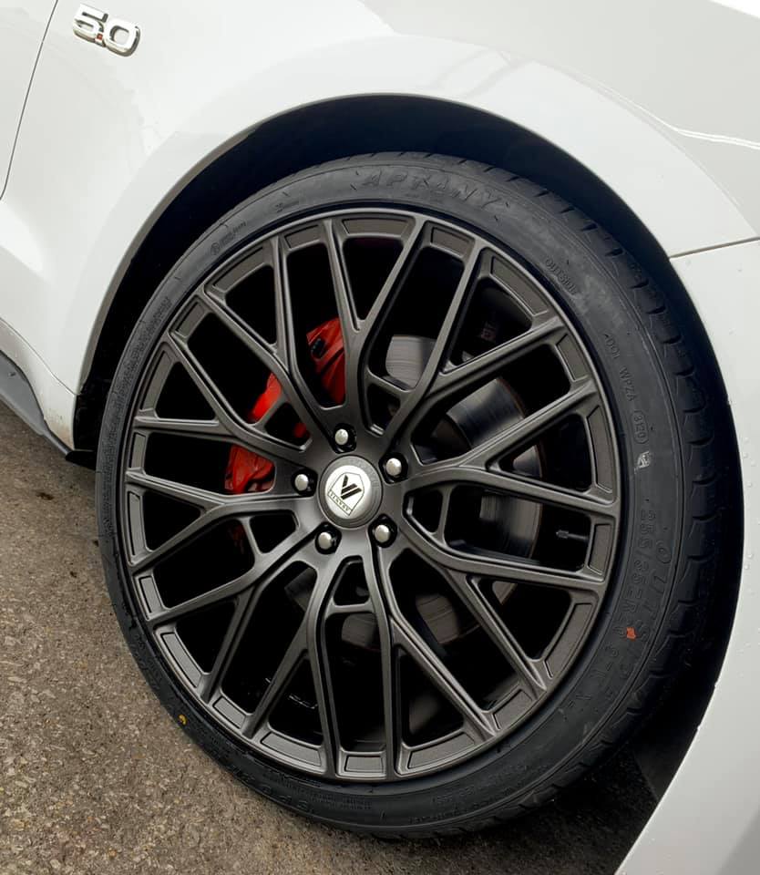 Black Wheel Of A White Car — Red Oak, TX — King Wheel & Tires