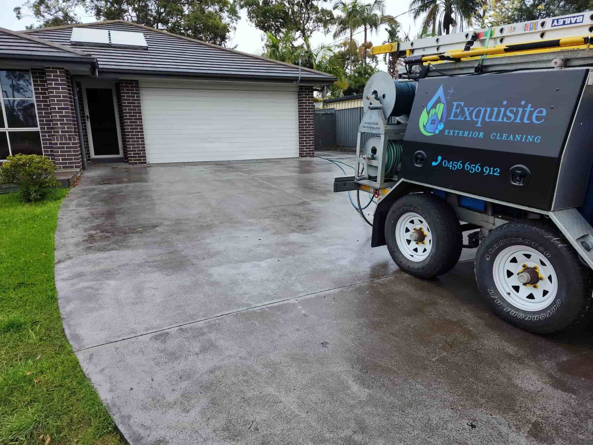 A Truck is Parked in Front of a House — Exquisite Exterior Cleaning In North Gosford, NSW