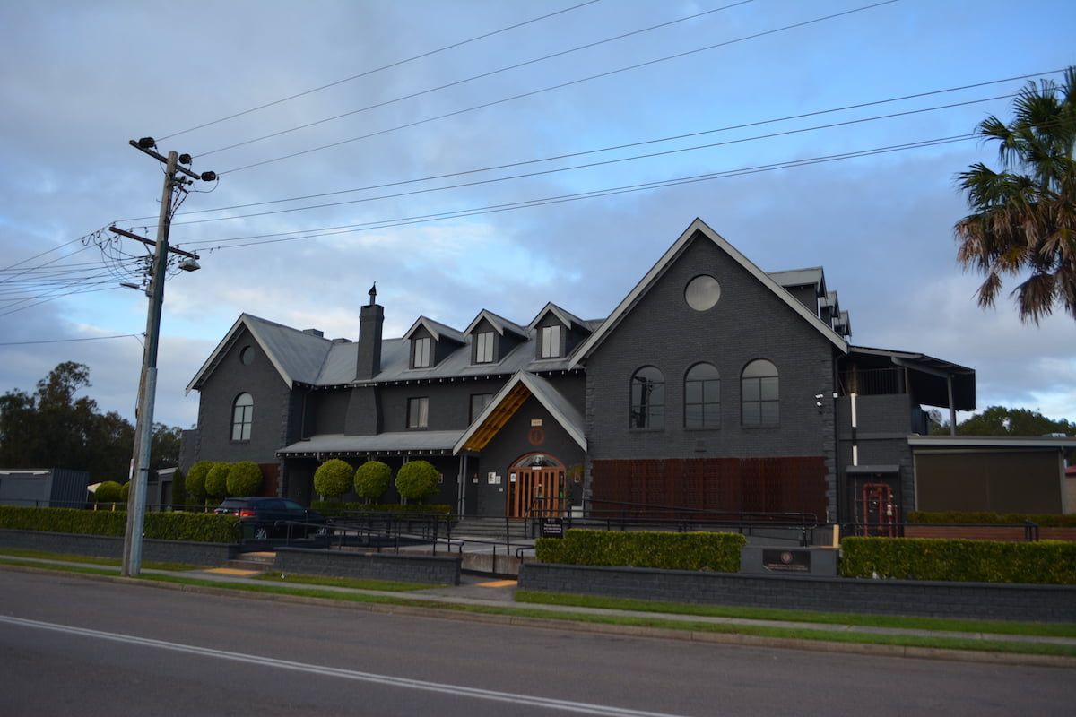 A Large Grey House With a Lot of Windows — Exquisite Exterior Cleaning In Erina, NSW