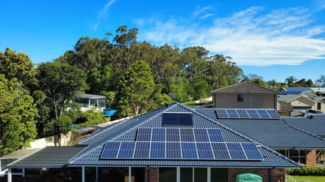 A riled roof restoration with solar panels in Moss Vale
