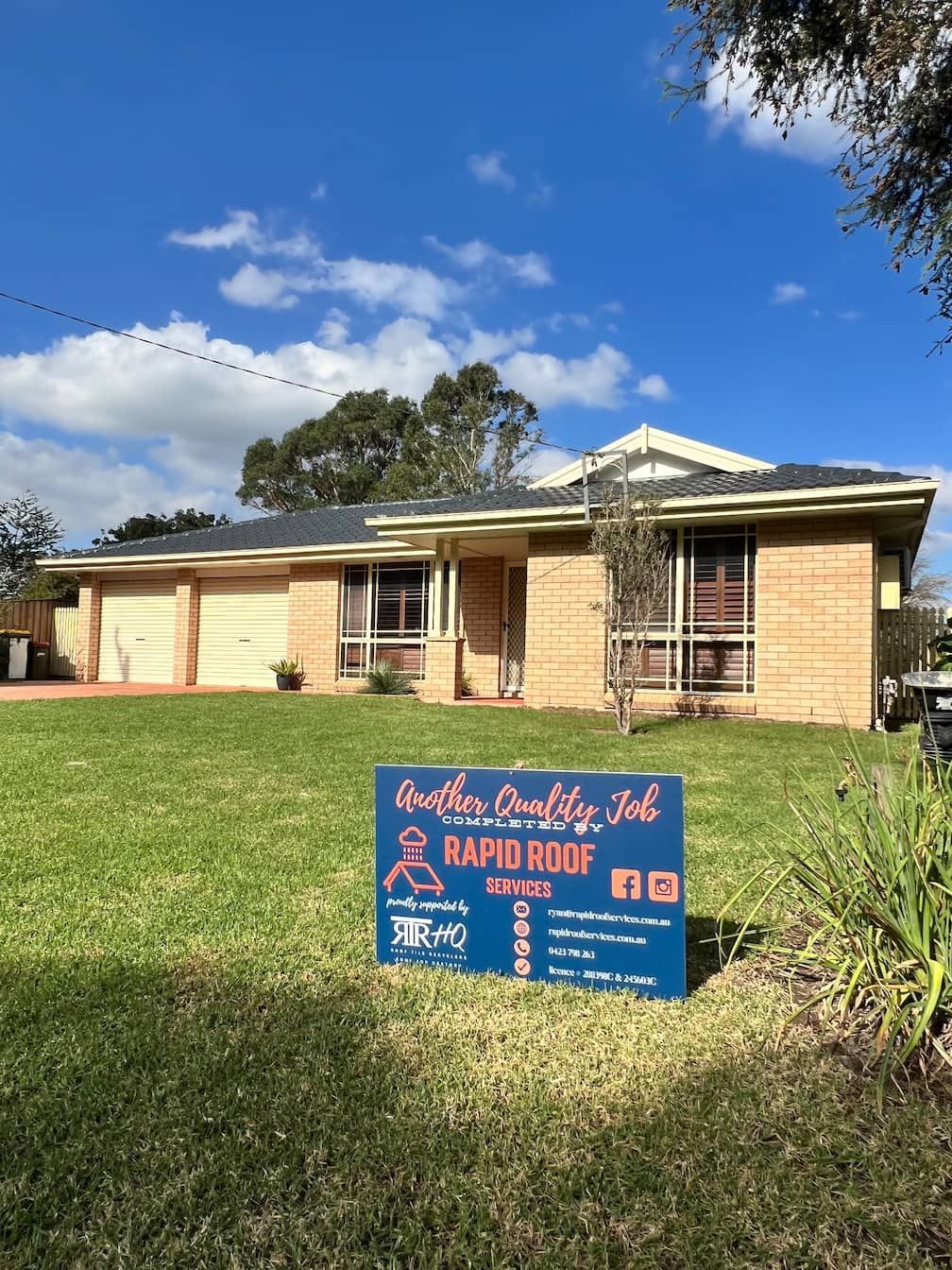 A Rapid Roof Services sign
