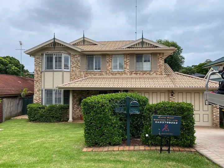 A faded Bowral roof before being restored