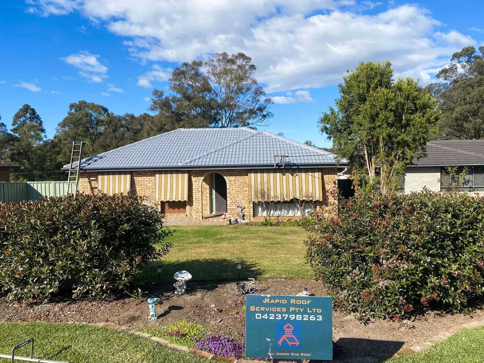 A house with a sign in front of it that says forever