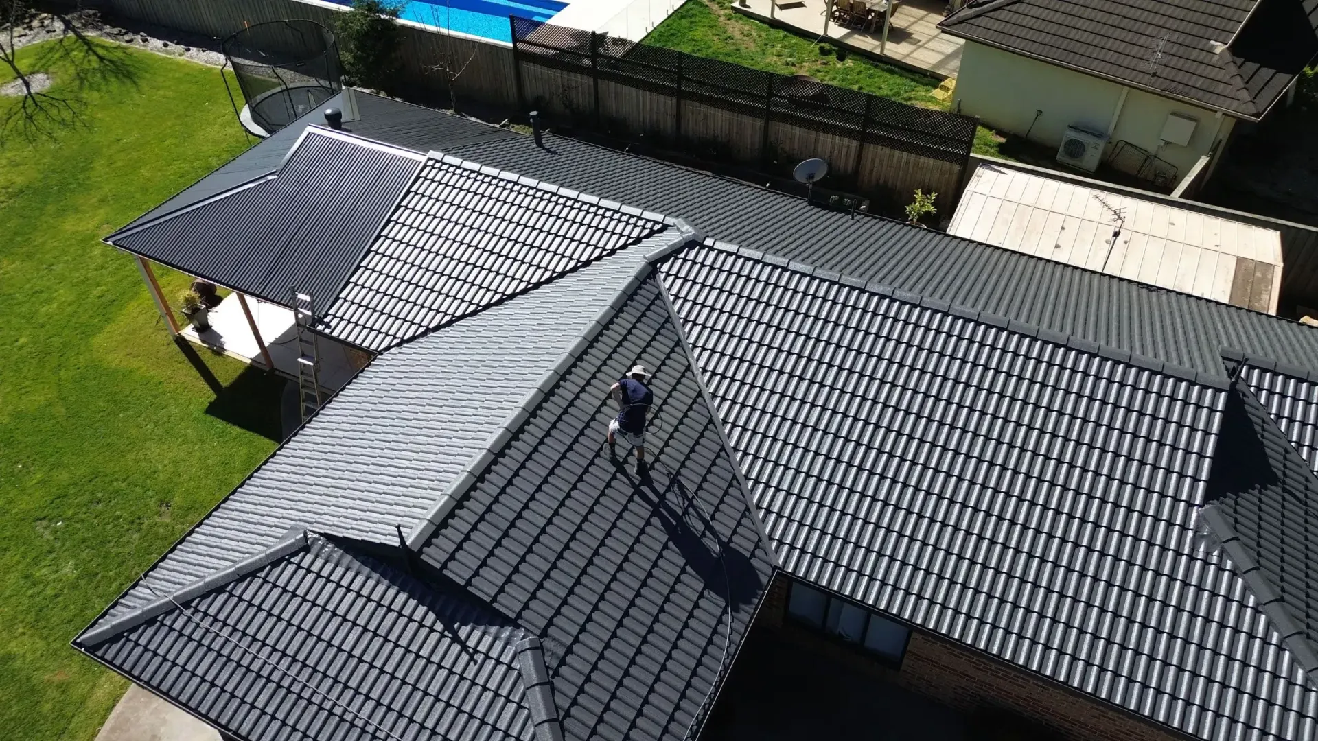 A person inspecting a Sydney roof