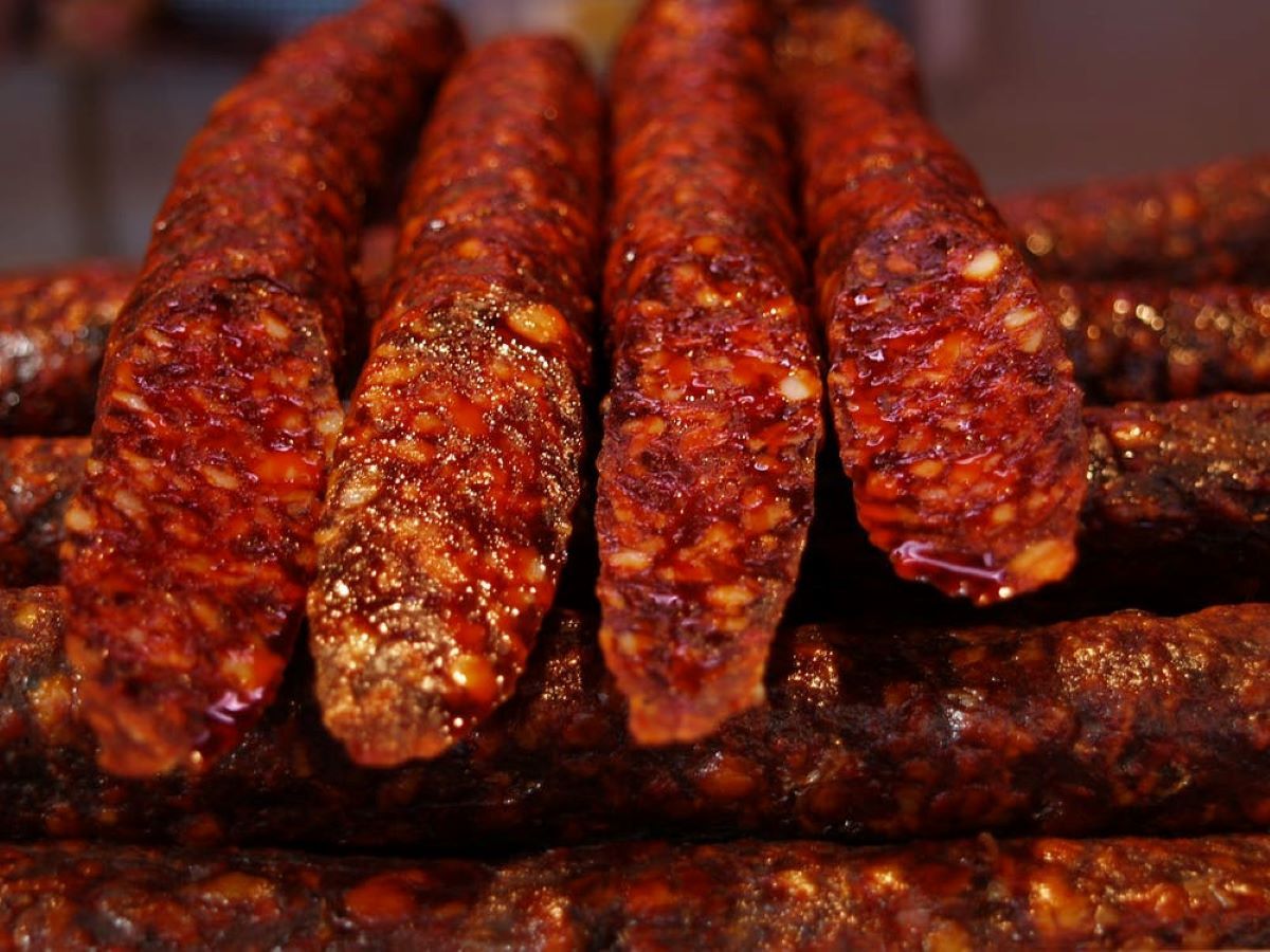 A Bunch of Sausages Are Stacked on Top of Each Other — Prime Meats NT in Coconut Grove, NT