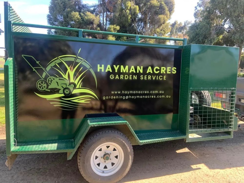 A green trailer for hayman acres garden service — Hayman Acres Garden Services In Undera, VIC 