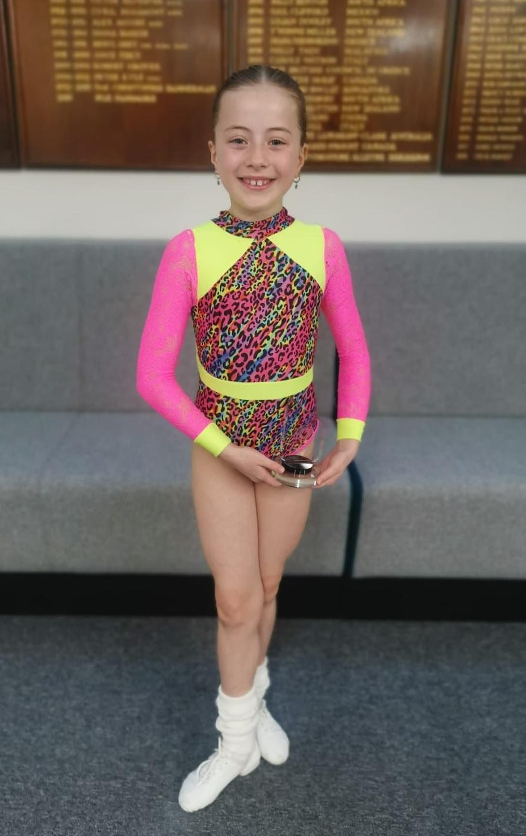 Young energetic dancer performs modern dance pose