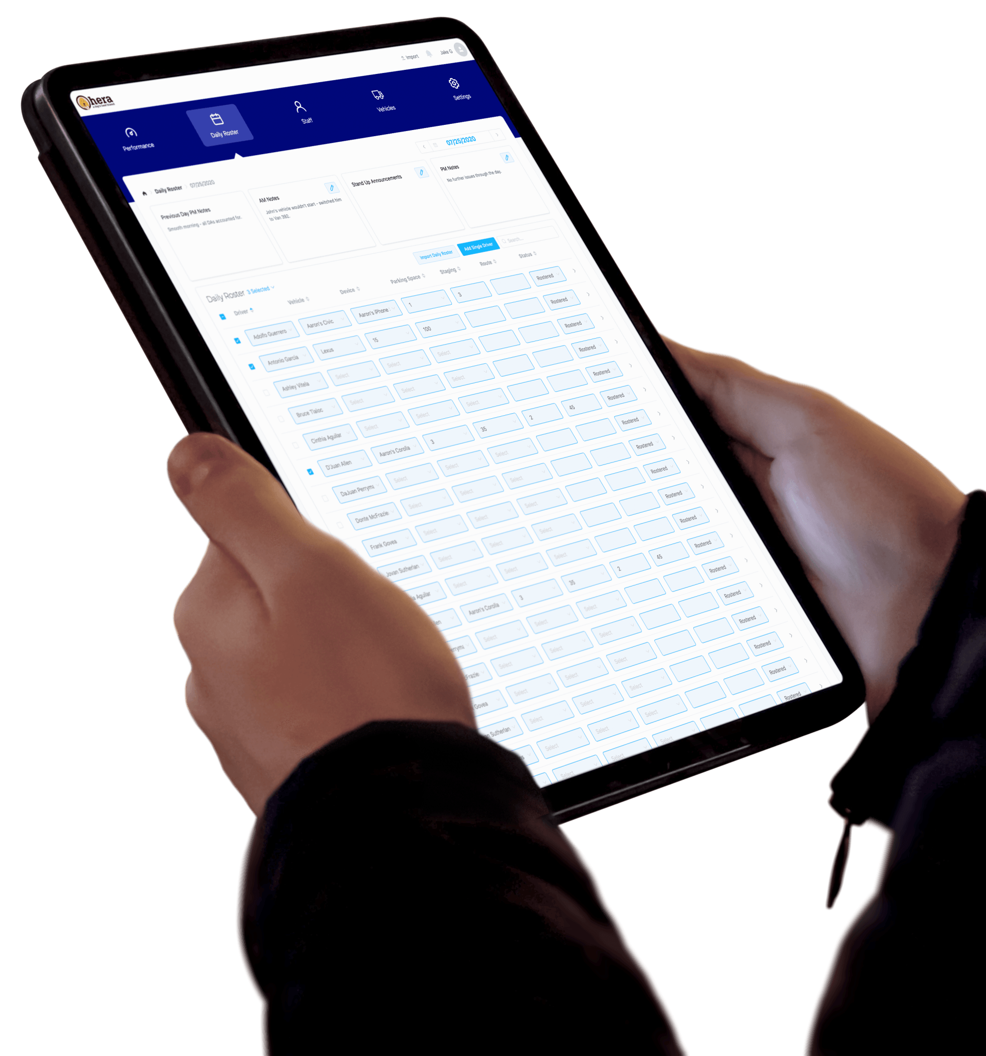 A person is holding a tablet with the Daily Roster screen from Hera.
