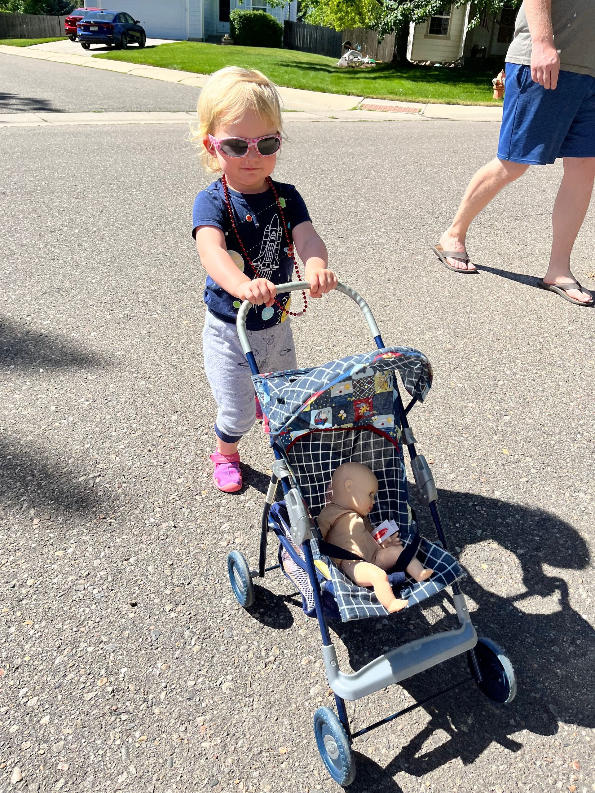 LBF Hero Abby Brown pushing a stroller