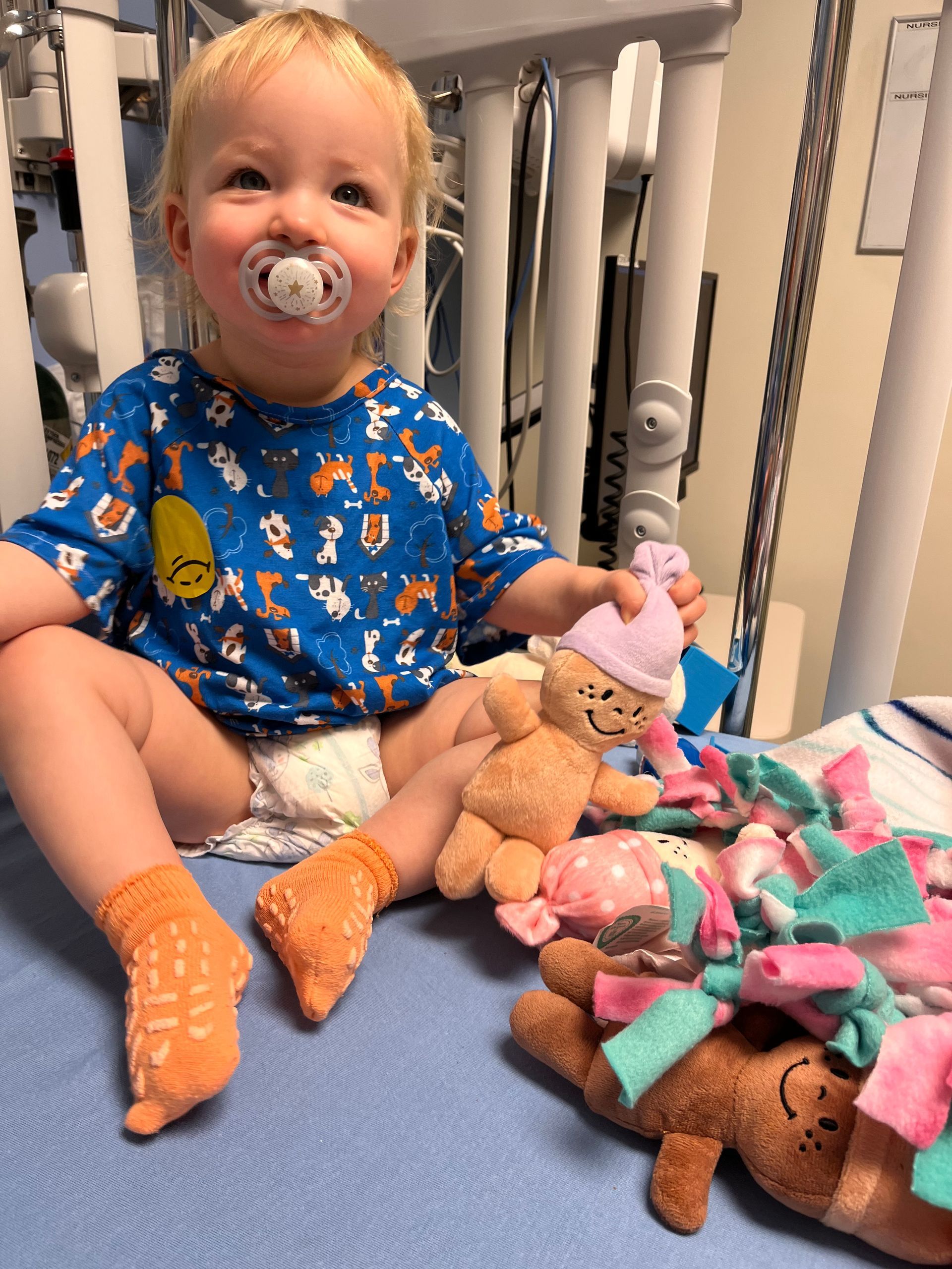 LBF Hero Abby Brown playing with stuffed animals