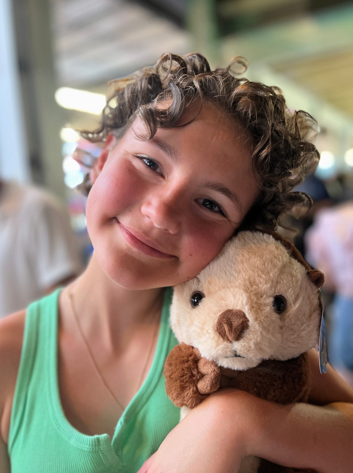 LBF Hero Charli Carr holding stuffed animal