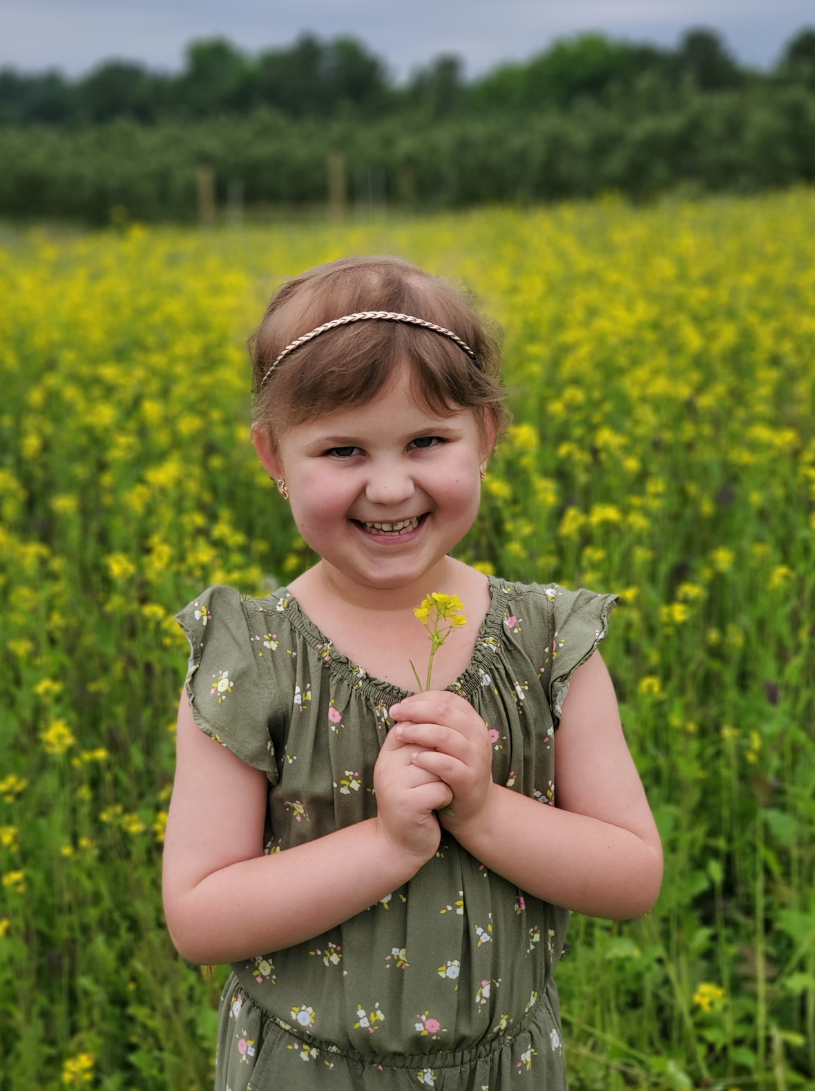 LBF Hero Abby holding sunflower
