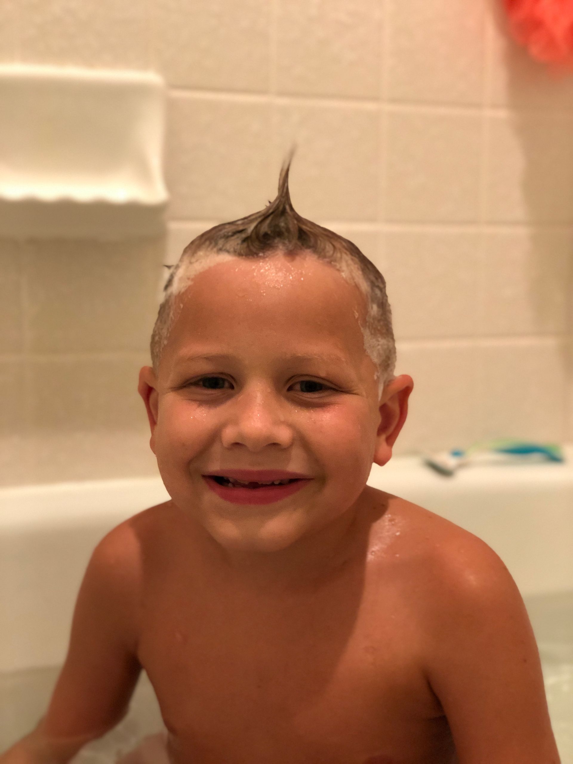 LBF Hero Joe Ludwikoski in bathtub with mohawk