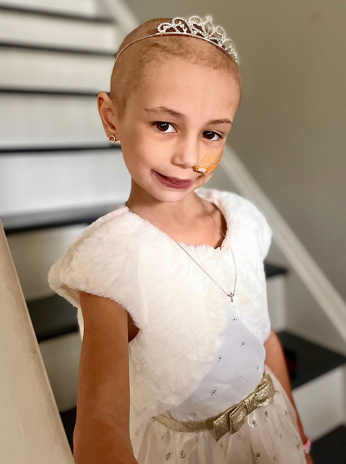 LBF Hero Charli Carr holding stuffed animal