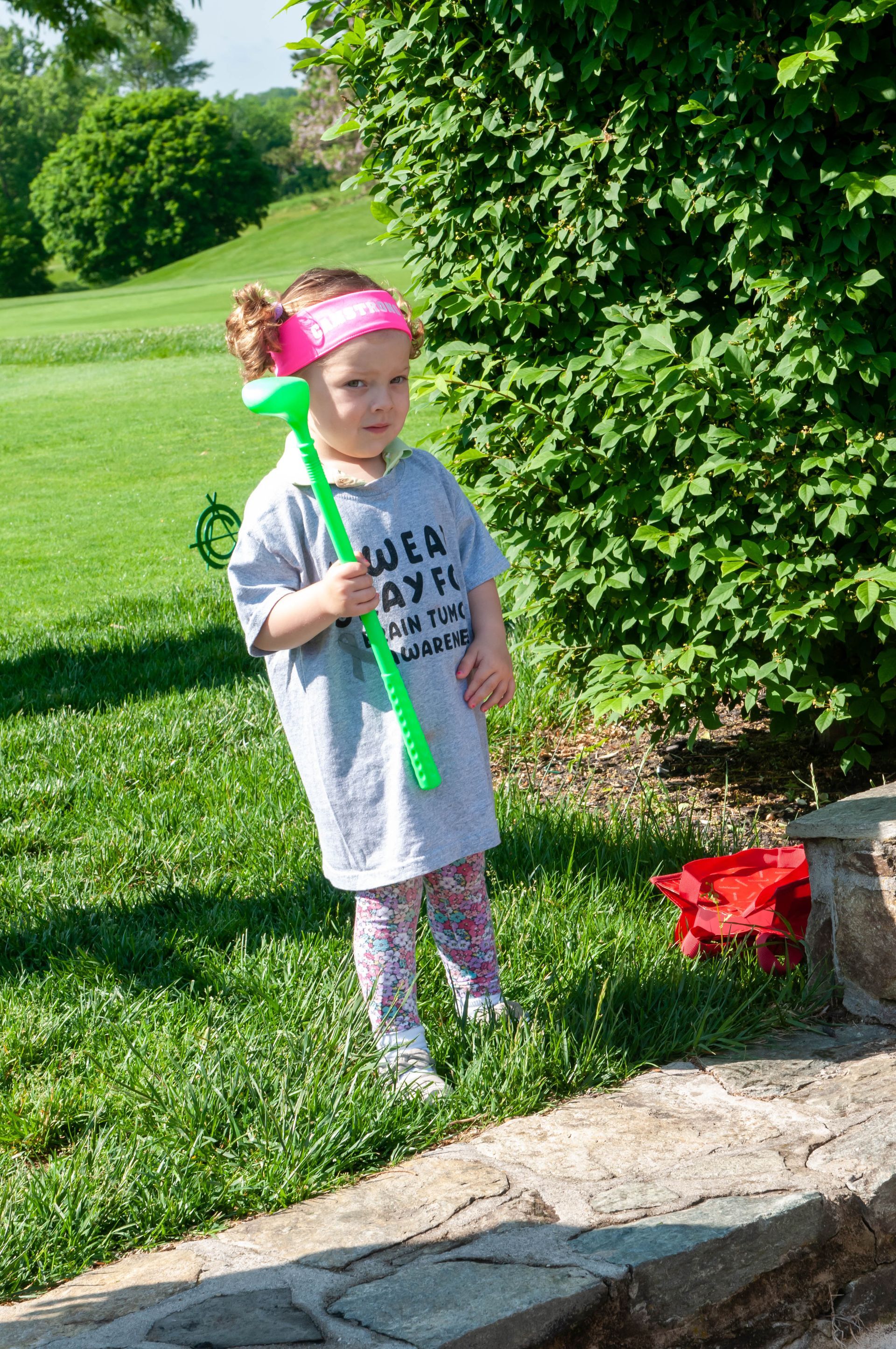 LBF Hero holding golf club