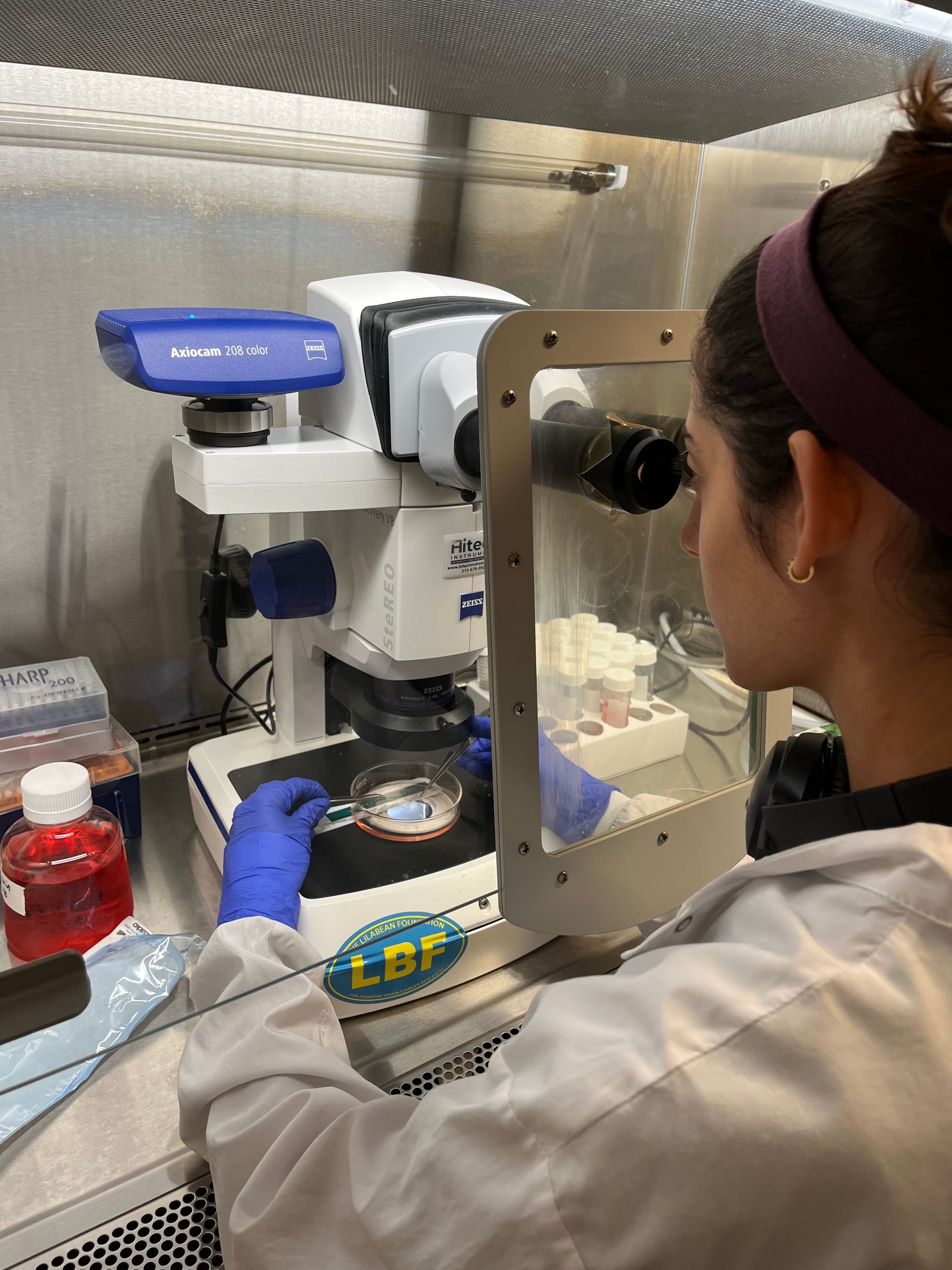 Dr. Mateusz researching in the lab