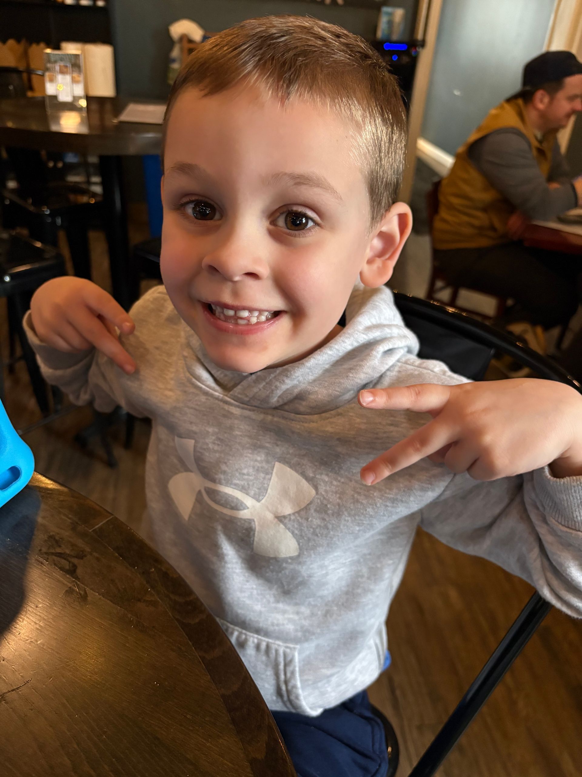 LBF Hero Cameron showing peace signs with hands