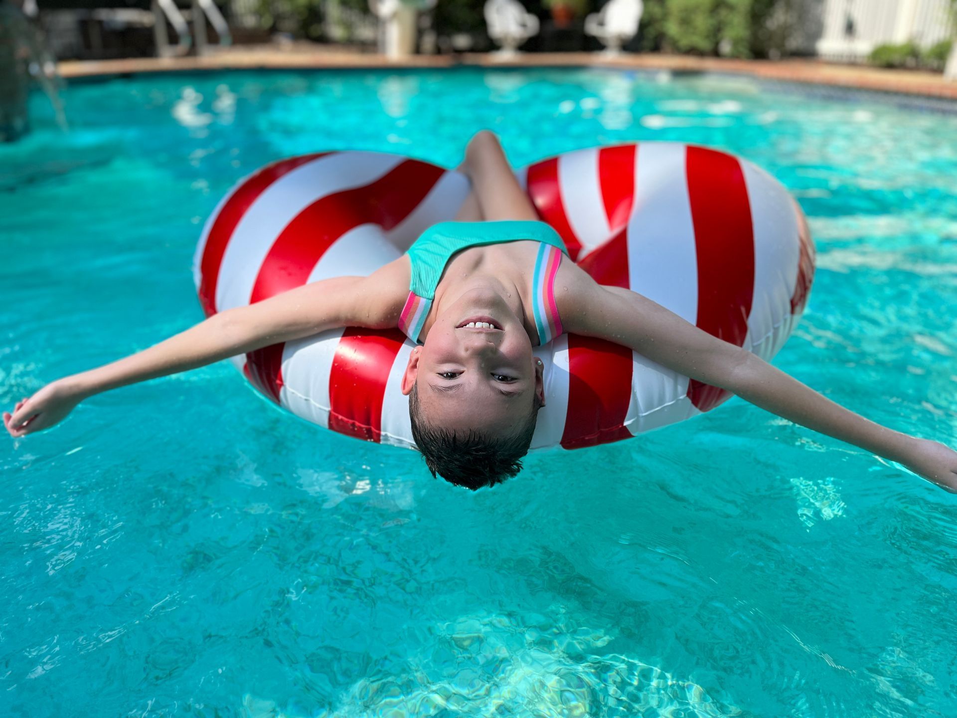 LBF Hero Charli Carr in pool on a float