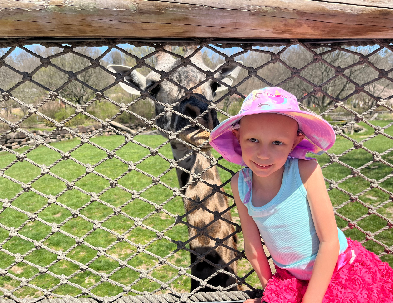 LBF Hero Kennedy Ranson with giraffe at the zoo