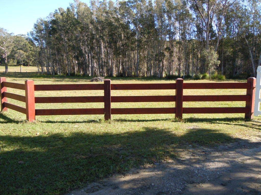 Timber Fence Surrounding Property — Professional Fencing in Taree, NSW
