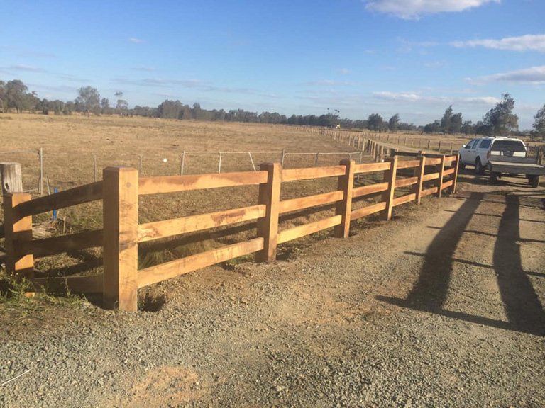 Wooden Fence Near Farm — Professional Fencing in Taree, NSW