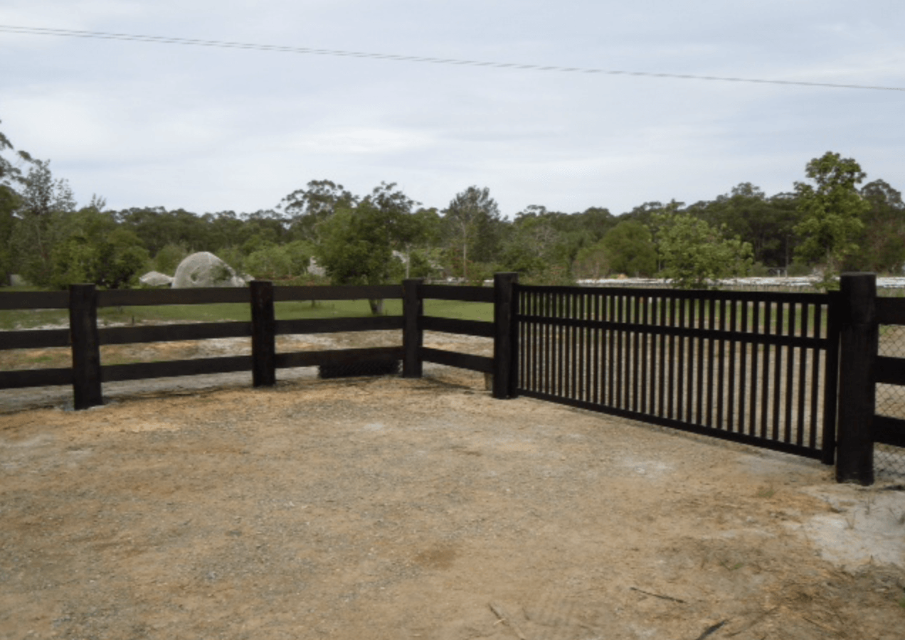 Black PVC Fence — Professional Fencing in Taree, NSW