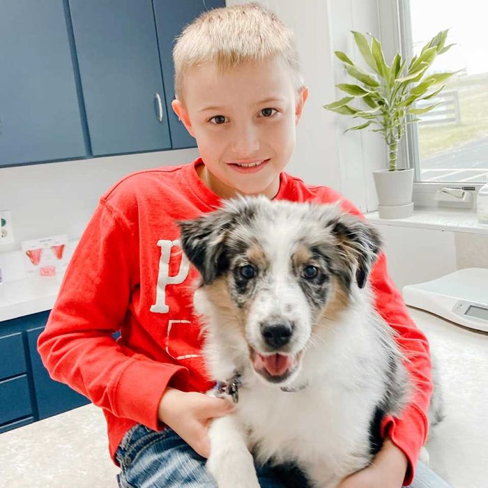 Kid With His Pet Puppy – Tompkinsville, KY – Monroe Veterinary Clinic