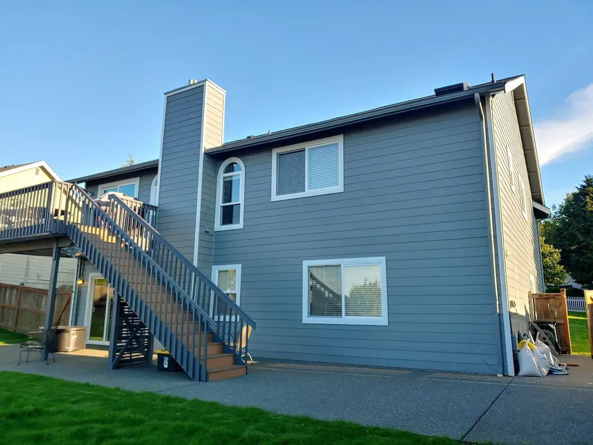 Gray painted house with a staircase