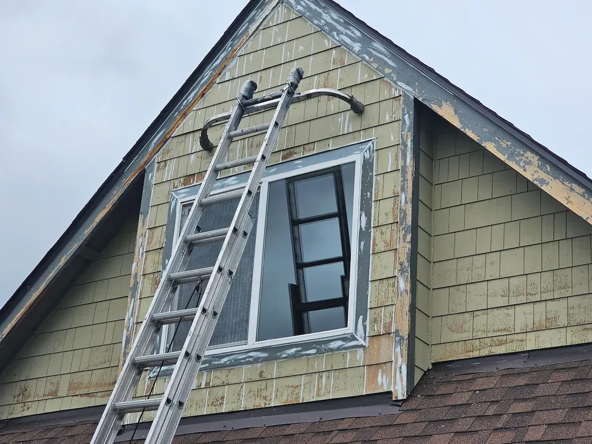 Aged exterior painting of a Bellingham home 