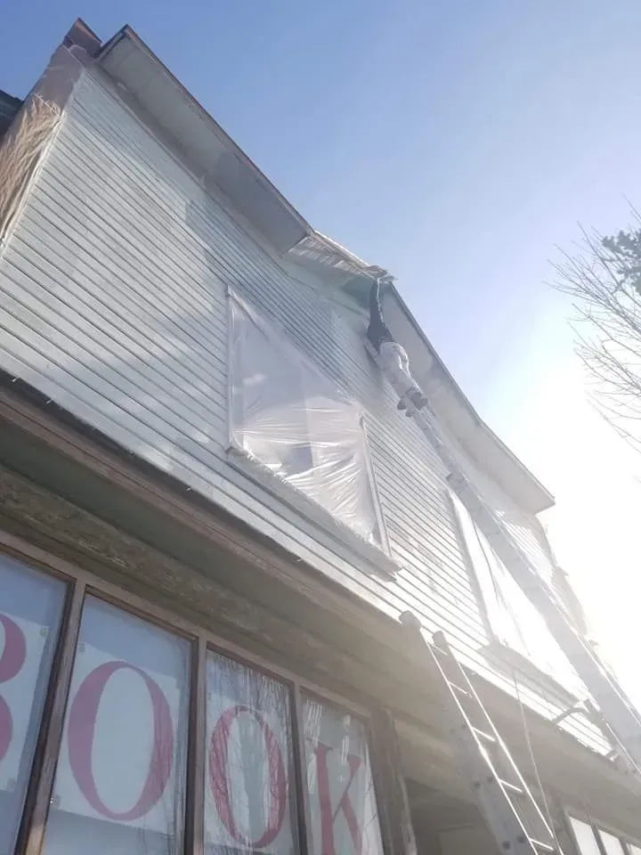 Contractor at work painting Bellingham, WA home.