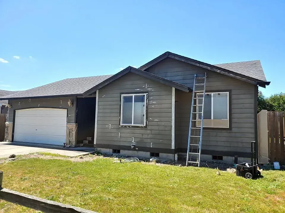 Faded and peeling paint on a Bellingham, WA home.
